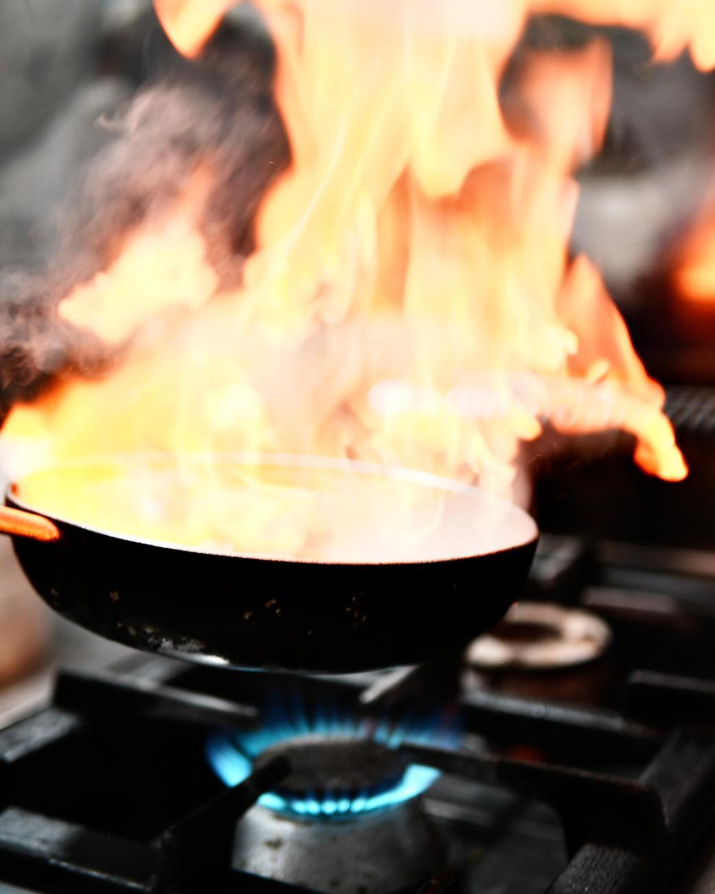 Cooking over open flame at Guma Bar Restaurant